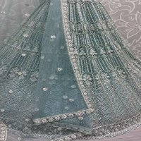 ANJANI ART D.NO 2860 WHOLESALE HEAVY NET DESIGNER LEHENGAS