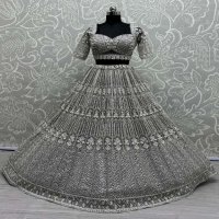ANJANI ART D.NO 2860 WHOLESALE HEAVY NET DESIGNER LEHENGAS