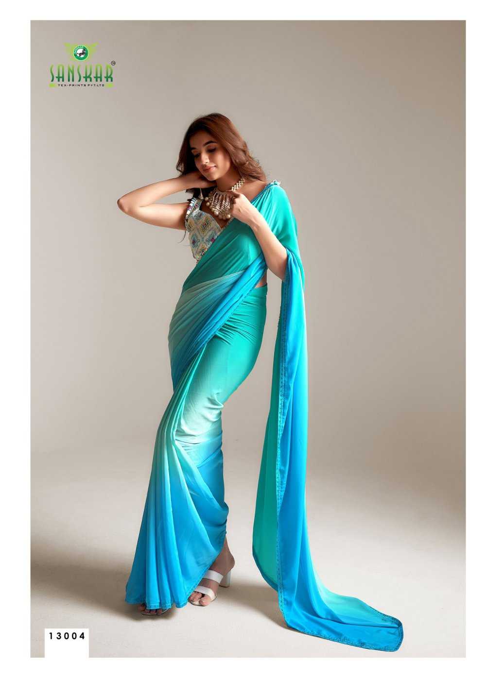 SANSKAR TEX NEXA ETHNIC STYLE SATIN GEORGETTE SIROWSKI WORK SAREE WHOLESALER