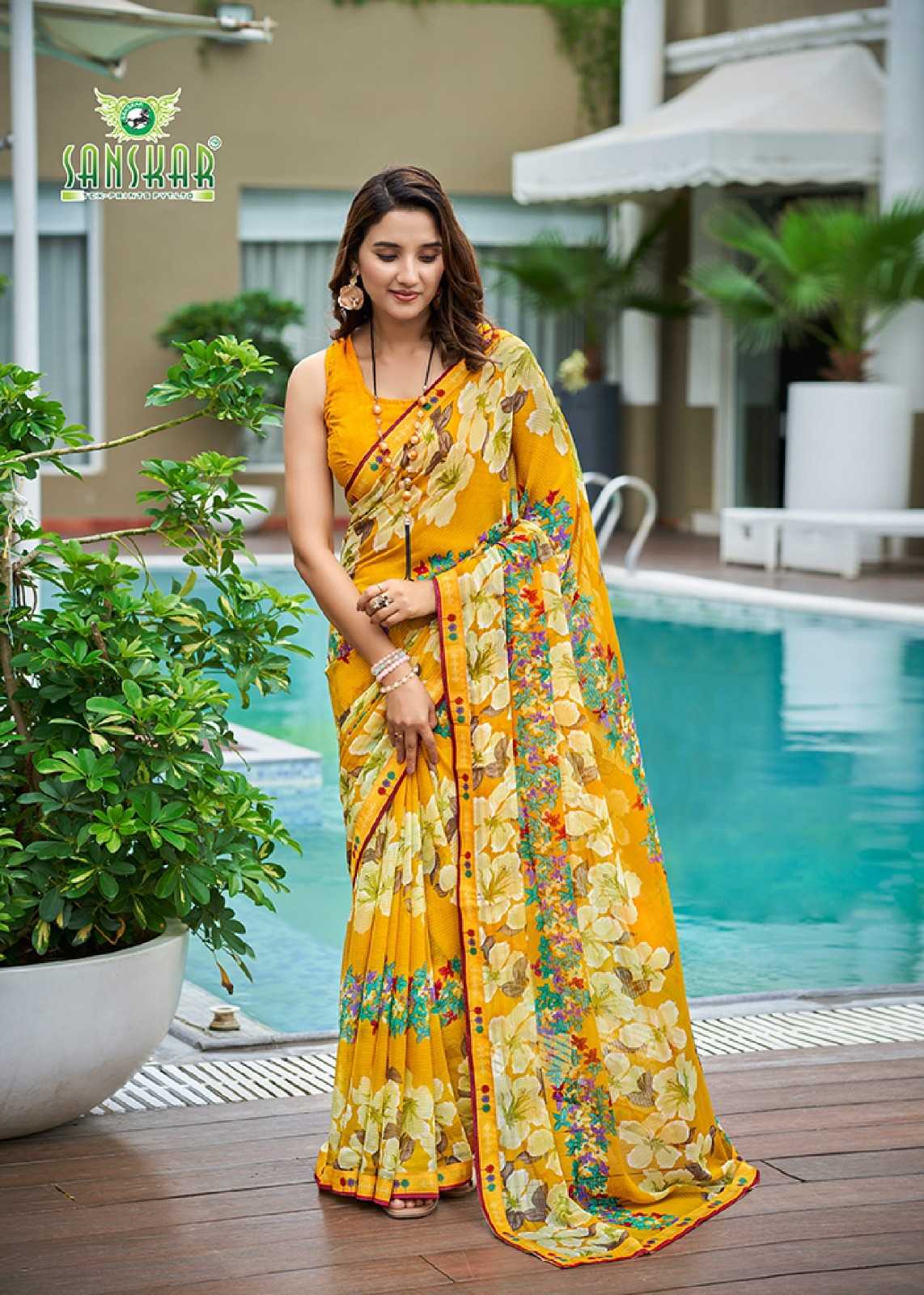 radhe by sanskar tex prints georgette new trendy saree wholesaler