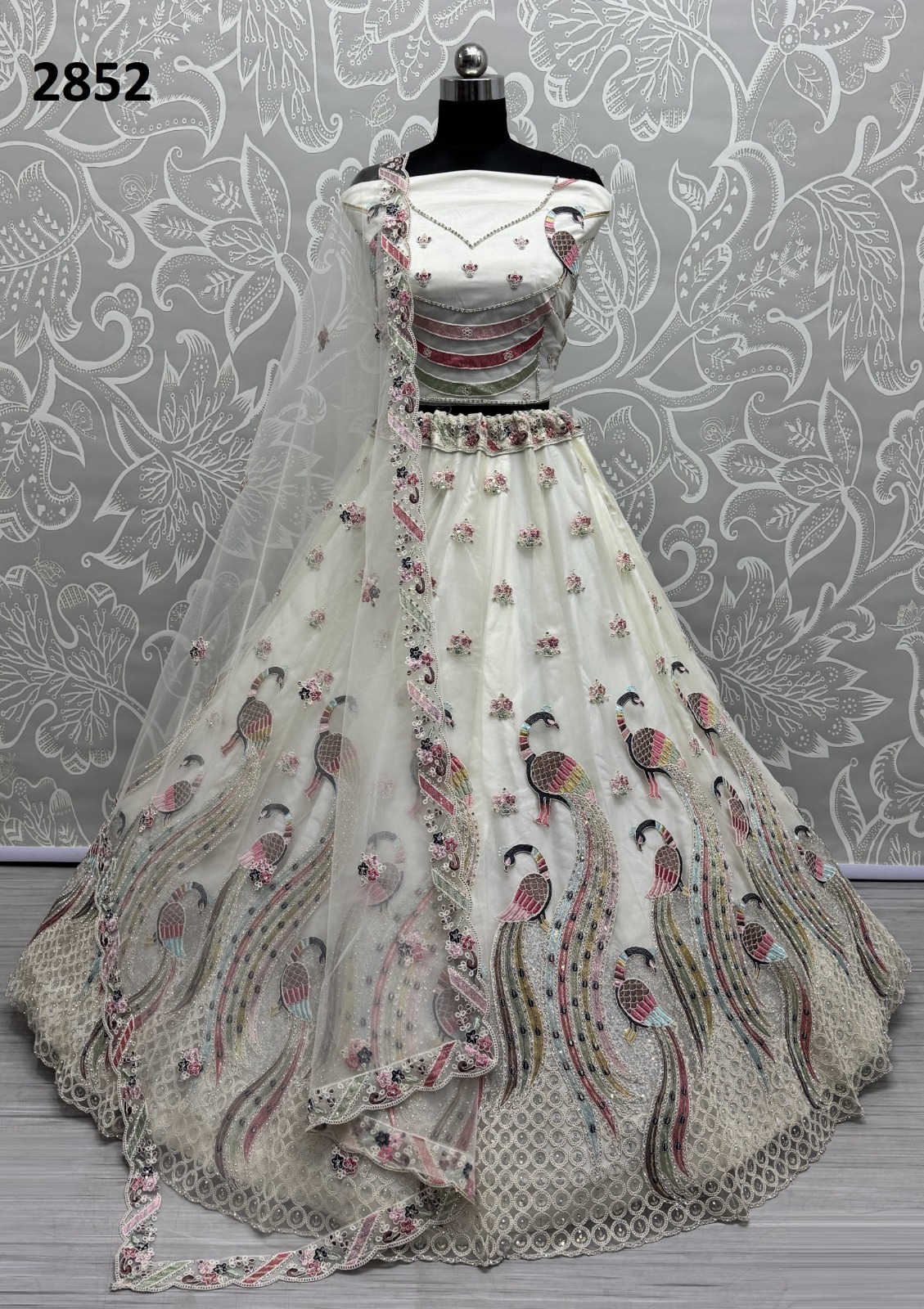 ANJANI ART D.NO 2852 WHOLESALE HEAVY NET DESIGNER LEHENGAS