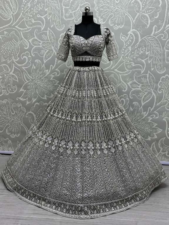 ANJANI ART D.NO 2860 WHOLESALE HEAVY NET DESIGNER LEHENGAS