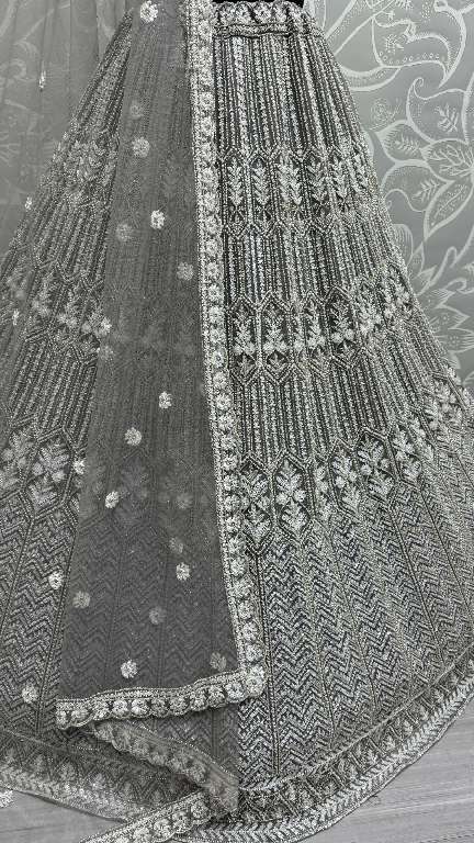 ANJANI ART D.NO 2860 WHOLESALE HEAVY NET DESIGNER LEHENGAS